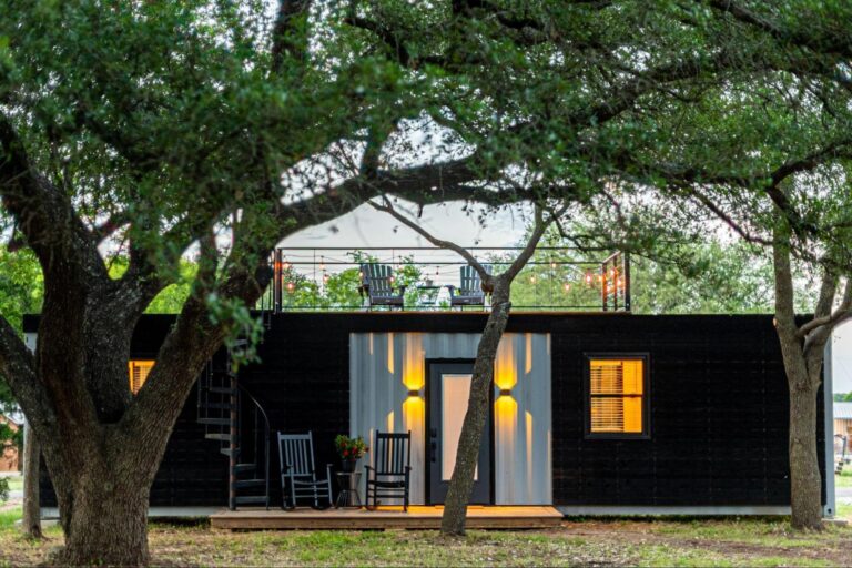 a granny flat surrounded by trees