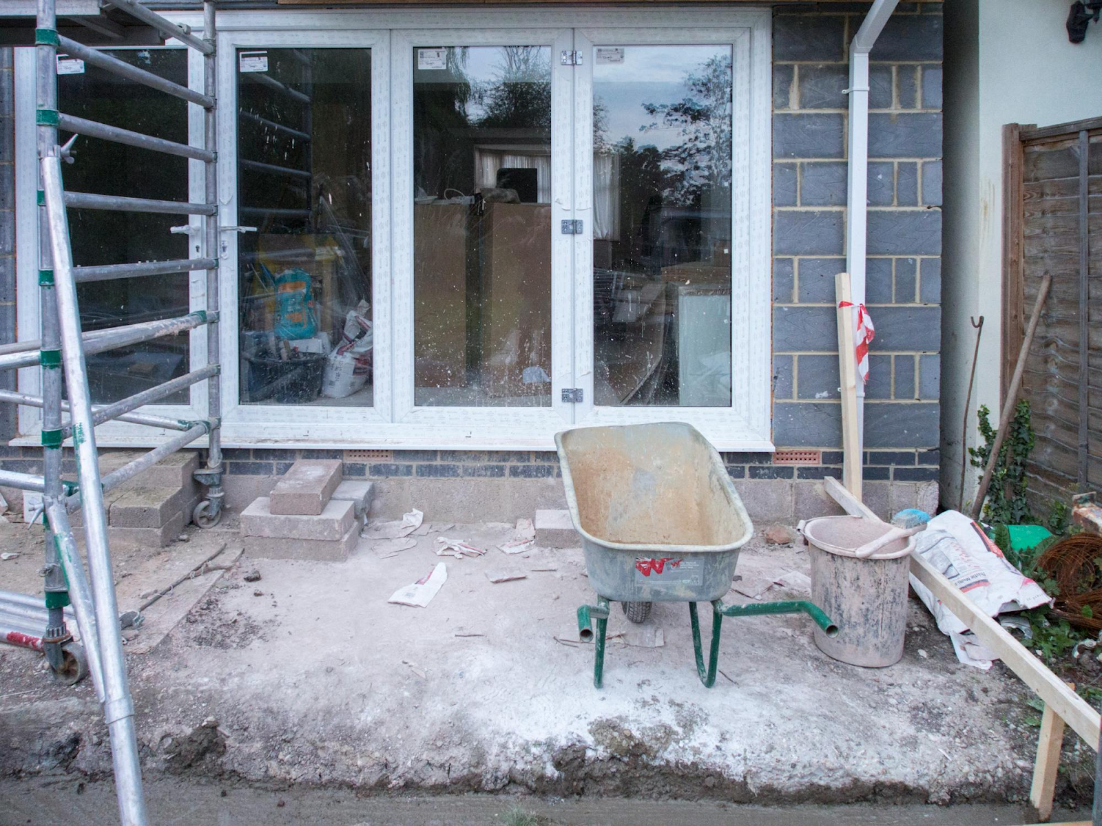  house renovation project with tools and scaffolding 